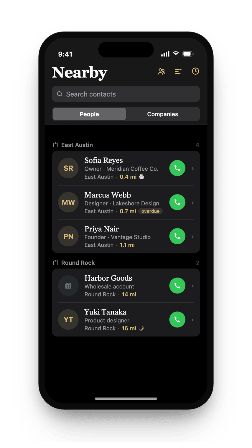 The Nearby list in dark mode, grouped by city and sorted by distance.